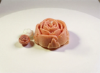 Rose shaped sweet pea scented candle